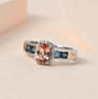 pink tourmaline aquamarine and moissanite ring in rhodium over sterling silver shown in a lifestyle photo