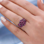 rhodolite garnet cluster ring in rhodium over sterling silver worn on a hand