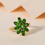 chrome diopside cluster ring in 18k yellow gold over sterling silver shown in a lifestyle photo