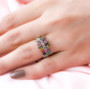 multi color tourmaline cluster ring in rhodium over sterling silver worn on a hand