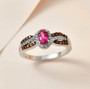 pink tourmaline brown zircon and white zircon ring in rhodium over sterling silver shown in a lifestyle photo