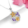 side view of citrine amethyst and zircon flower pendant necklace in rhodium over sterling silver