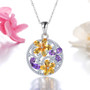 citrine amethyst and zircon flower pendant necklace in rhodium over sterling silver shown in a lifestyle photo