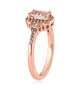 side view of morganite and zircon halo wedding ring in 18k rose gold over sterling silver