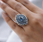 london blue topaz cluster ring in 18k yellow gold and rhodium over sterling silver worn on a hand
