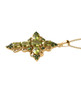 side view of peridot and chrome diopside cross pendant necklace in 18k yellow gold over sterling silver