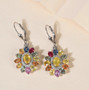 multi color sapphire and zircon lever back earrings in rhodium over sterling shown in a lifestyle photo