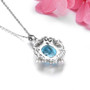 back view of sky blue topaz pearl and white zircon necklace in rhodium over sterling silver