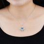 sky blue topaz pearl and white zircon necklace in rhodium over sterling silver worn around the neck