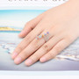 multi gemstone bypass line ring in rhodium over sterling silver worn on a hand