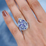 tanzanite aquamarine and zircon pear cluster ring in rhodium over sterling silver worn on a hand