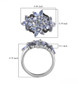 tanzanite and black spinel flower ring in rhodium over sterling silver shown for size comparison
