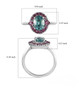 blue zircon and rhodolite garnet halo ring in rhodium over sterling silver shown for size comparison