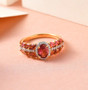 rubellite tourmaline and white zircon ring in 18k yellow gold over sterling silver shown in a lifestyle photo