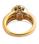back view of tanzanite and moissanite wedding ring in 18k yellow gold over sterling silver