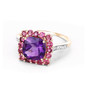 angled view of amethyst pink tourmaline and diamond halo ring in 10k yellow gold