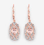 morganite and white topaz leverback earrings in 14k yellow gold over sterling silver shown in a lifestyle photo