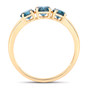 side view of round blue diamond trilogy ring in 14k yellow gold