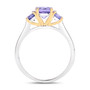 side view of round tanzanite trilogy ring in 14k yellow gold and rhodium over sterling silver