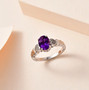 amethyst and diamond heart ring in rhodium over sterling silver shown in a lifestyle photo