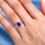 amethyst and diamond heart ring in rhodium over sterling silver worn on a hand