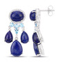 side view of lapis blue and white topaz dangle earrings in rhodium over sterling silver