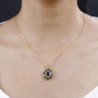 amethyst moissanite and chrome diopside pendant necklace in 18k yellow gold over sterling silver worn around the neck