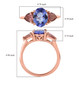 tanzanite and pink tourmaline three stone ring in 18k rose gold over sterling silver shown for size comparison