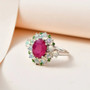 ruby opal and chrome diopside halo ring in rhodium over sterling silver shown in a lifestyle photo