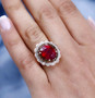 ruby (ff) brown and white zircon halo ring in 18k rose gold over sterling silver worn on a hand