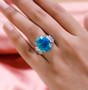 blue and green quartz triplet and white zircon statement ring in rhodium over sterling silver worn on a hand
