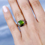 ammolite brown and white zircon ring in 18k rose gold over sterling silver worn on a hand