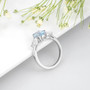 aquamarine and white zircon trilogy ring in rhodium over sterling silver