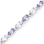 close up of aquamarine and tanzanite oval tennis bracelet in rhodium over sterling silver