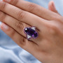 amethyst rhodolite garnet and zircon statement ring in rhodium over sterling silver worn on a hand