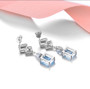 sky blue topaz and white zircon elegant dangle earrings in rhodium over sterling silver