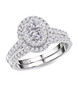 oval diamond halo two ring bridal set in 14k white gold