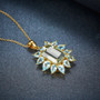 full view of prasiolite and sky blue topaz halo necklace in yellow gold over sterling silver