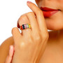 multi sapphire and white topaz band ring in 14k yellow gold over sterling silver worn on a hand