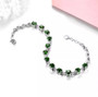 full view of chrome diopside and white zircon bracelet in rhodium over sterling silver