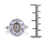 gray moonstone and tanzanite halo ring in rhodium over sterling silver shown for size comparison