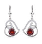 garnet and moissanite heart dangle earrings in rhodium over sterling silver