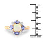 ethiopian opal tanzanite and diamond 10k yellow gold halo ring shown for size comparison