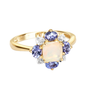angled view of ethiopian opal tanzanite and diamond 10k yellow gold halo ring