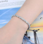 aquamarine and white zircon tennis bracelet in rhodium over sterling silver