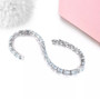 close up of aquamarine and white zircon tennis bracelet in rhodium over sterling silver