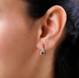 orange and white diamond dangle earrings in 18k yellow gold over sterling silver worn on the ear