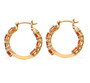 side view of fire opal and moissanite hoop earrings in 18k yellow gold over sterling silver