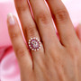 morganite pink sapphire and freshwater pearl halo ring in 18k rose gold over sterling silver worn on a hand