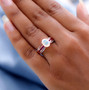 ethiopian opal pink sapphire and white zircon bridge ring in 18k rose gold over sterling silver worn on a hand
